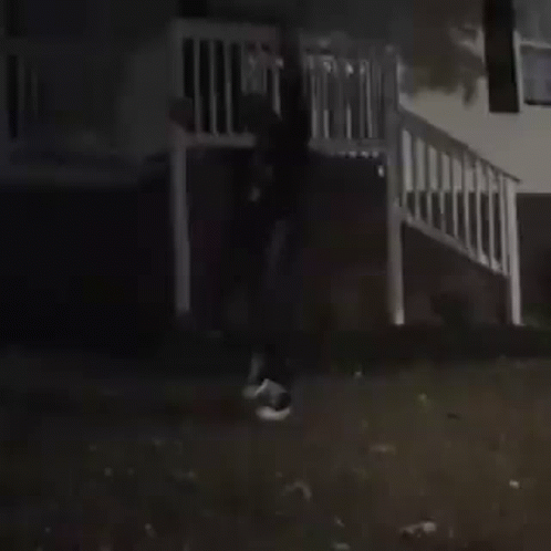 Man in Black Jacket and White Shirt in Dark