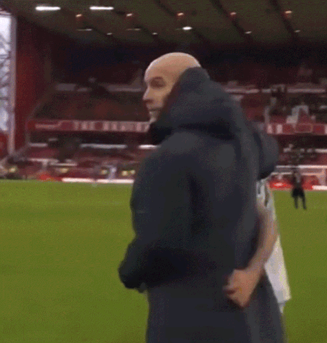Man in Black Jacket Clapping