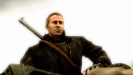 Man in Black Jacket Holding Sword