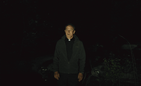 Man in Black Jacket in Dark