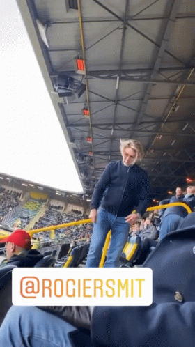 Man in Black Jacket in Stadium @rociersmit