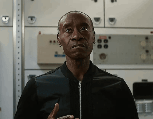 Man In Black Jacket Looking At Camera GIF