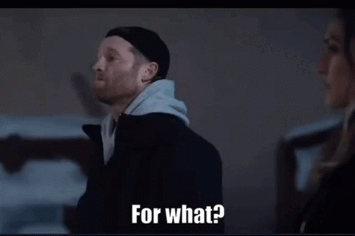 Man in Black Jacket Says For What