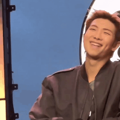 Man in Black Jacket Smiling