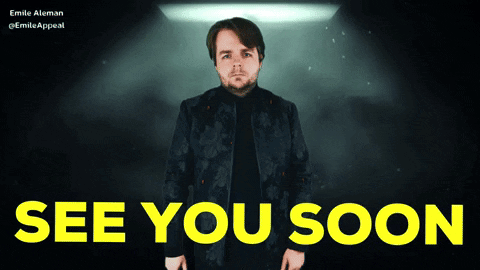 Man In Black Jacket Standing Before See You Soon Sign GIF