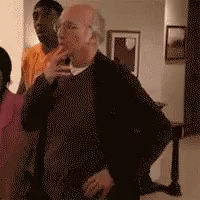 Man In Black Jacket Standing In Room GIF