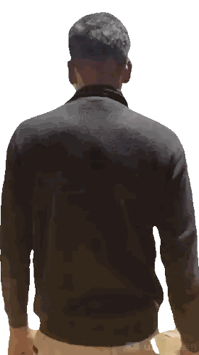 Man in Black Jacket Walking Dirt Road