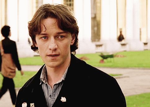 Man in Black Jacket with A Pin