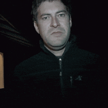 Man in Black Jacket With Letter A