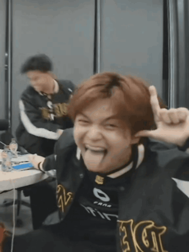 Man In Black Jacket With Letter G GIF