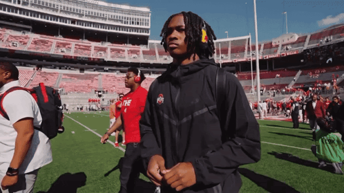 Man in Black Jacket With Ohio on Front