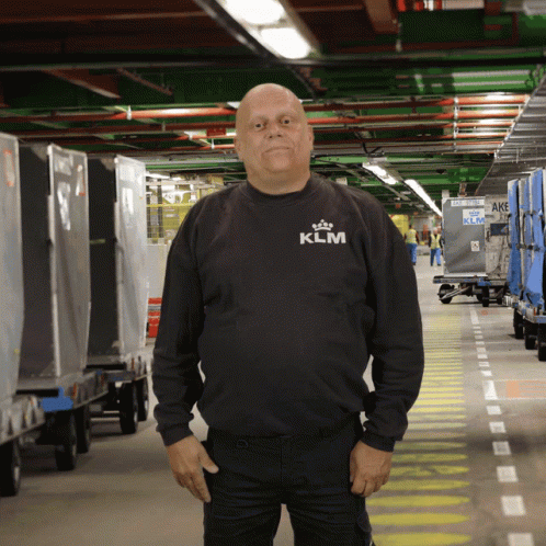 Man in Black KLM Sweatshirt Warehouse