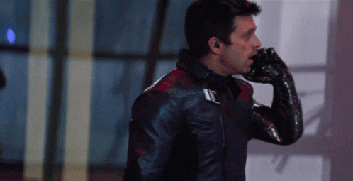 Man in Black Leather Jacket and Black Glove
