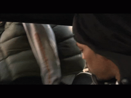 Man In Black Nike Hat Looking Down GIF