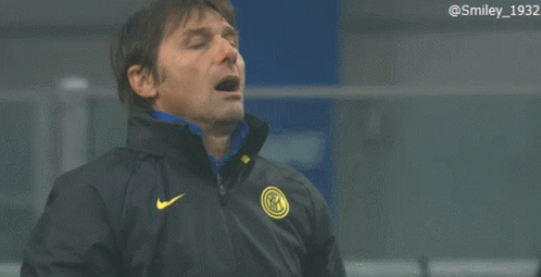 Man In Black Nike Jacket With Yellow Logo GIF