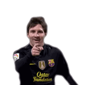 Man in Black Qatar Foundation Jersey Pointing