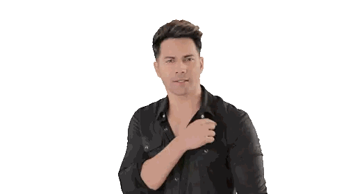 Man in Black Shirt Adjusting Collar