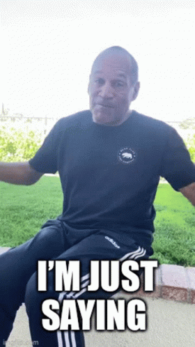 Man in Black Shirt and Adidas Pants Saying Just Saying