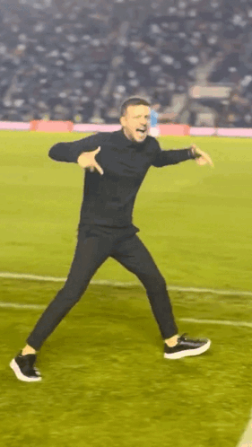 Man in Black Shirt and Pants Dancing