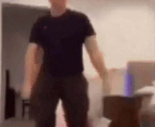 Man In Black Shirt And Pants GIF