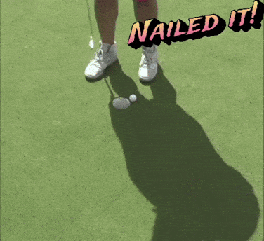 Man in Black Shirt and Pink Shorts on Golf Course