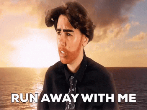 Man In Black Shirt And Tie Saying Run Away GIF