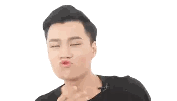 Man in Black Shirt Blowing Kiss