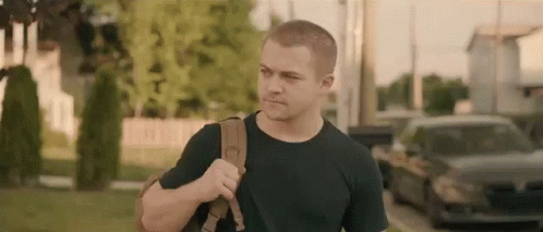 Man In Black Shirt Carrying Backpack GIF