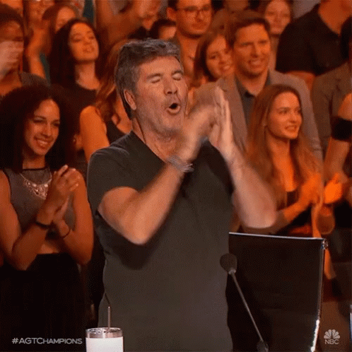 Man in Black Shirt Clapping