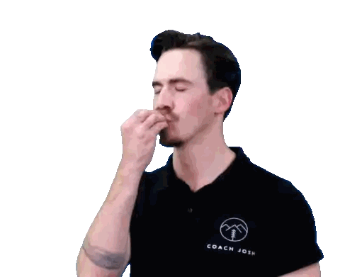 Man in Black Shirt Coach Josh