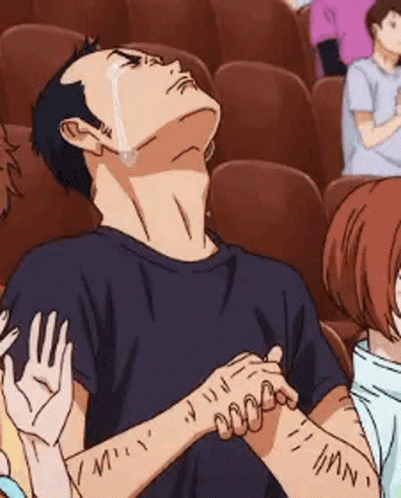 Man in Black Shirt Crying in Theatre