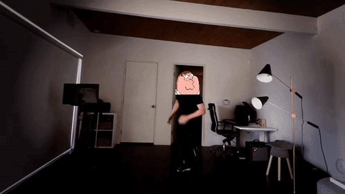 Man in Black Shirt Dancing with Cartoon Character