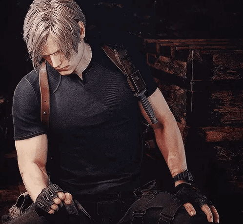 Man In Black Shirt Holding Gun And Gloves GIF