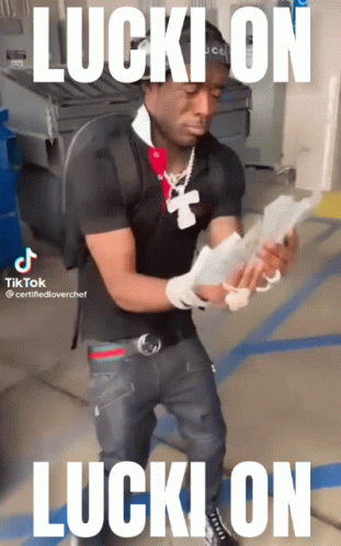 Man In Black Shirt Holding Money GIF