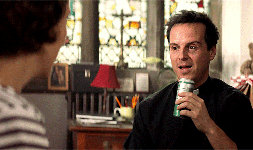 Man In Black Shirt Holding Soda Can GIF