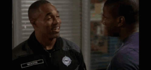 Man In Black Shirt Hugging Another Man GIF
