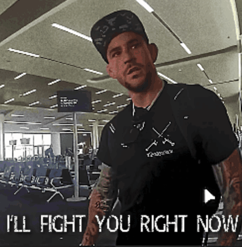 Man in Black Shirt I'll Fight You Right Now Waiting Room