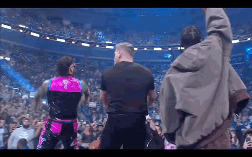 Man in Black Shirt in Crowd