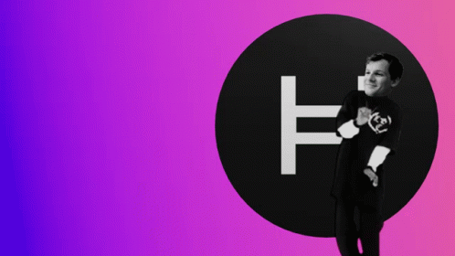 Man In Black Shirt In Front Of Circle With Letter F GIF