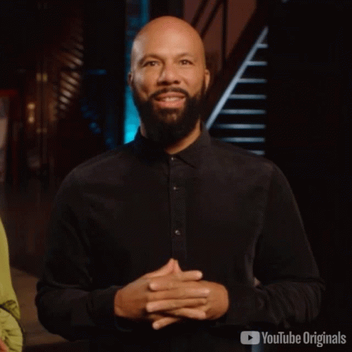 Man In Black Shirt In Front Of YouTube Originals Logo GIF