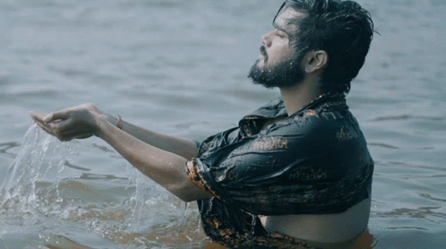 Man In Black Shirt In Water GIF