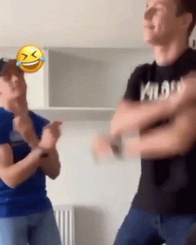 Man in Black Shirt Kilo Dancing with Woman