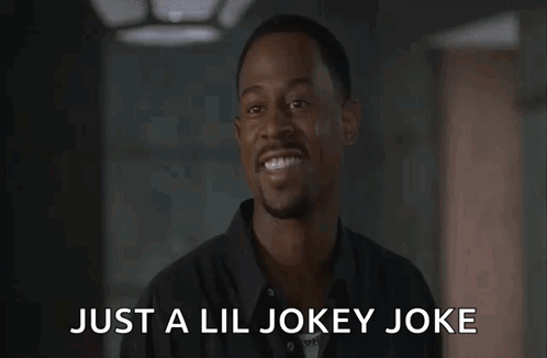 Man in Black Shirt Laughing Just a Lil Jokey Joke