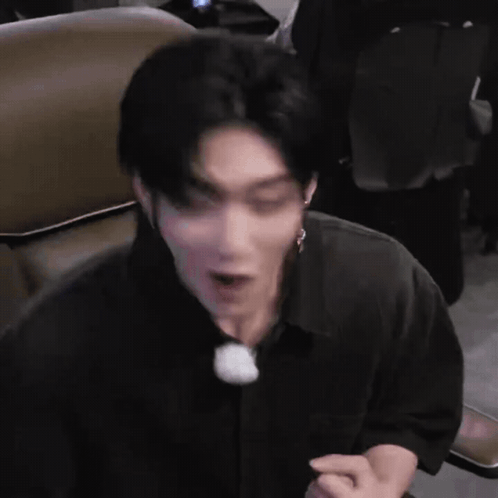 Man in Black Shirt Making Face