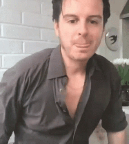 Man in Black Shirt Making Funny Face