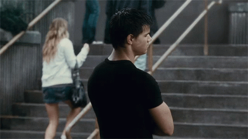 Man in Black Shirt on Steps