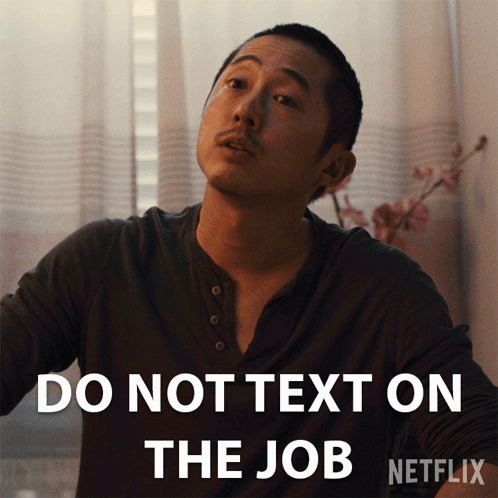Man in Black Shirt Saying Do Not Text on the Job