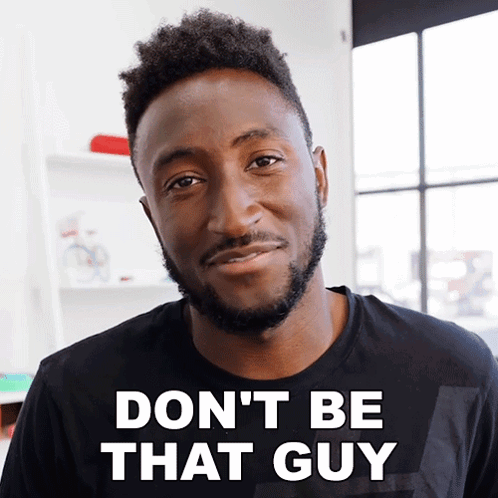 Man in Black Shirt Saying Dont Be That Guy