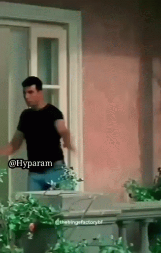 Man In Black Shirt Saying Hyparam At Window GIF