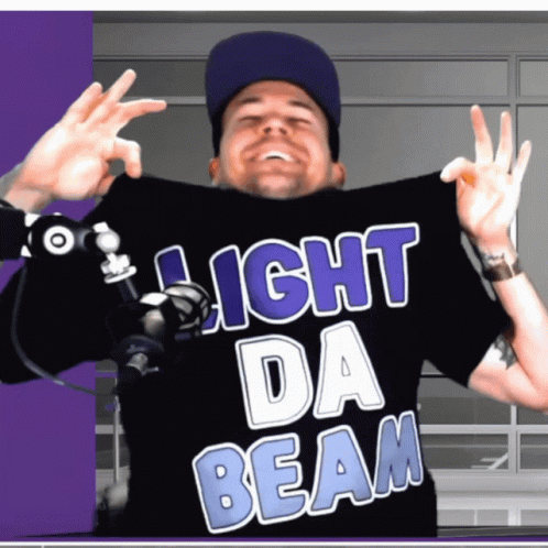 Man In Black Shirt Saying Light Da Beam GIF